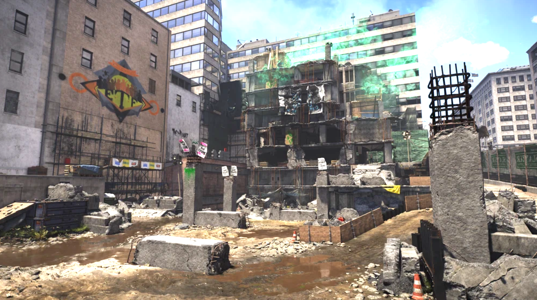 图片展示的是《全境封锁2》中报复行动控制点的场景。画面中，一栋建筑被毁，周围堆放着石块、木箱等障碍物，地面上有积水。建筑外墙上涂鸦显眼，建筑旁有脚手架。背景中可见多栋建筑，其中一栋建筑外立面有绿色的装饰。该图片与上下文关系紧密，直观呈现了报复行动中控制点的环境，帮助理解玩家在攻打控制点时的场景背景。